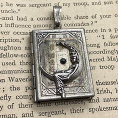 Moon Maiden Book Locket Pendant #boho #localartist #madhatter #uniquejewelry #gothicstyle #statementjewelry #industrialdesign #handmadejewelry #reimagined #artjewelry Unique Silver Necklace, Magical Relics, Diy Trinkets, Unique Locket, Moon Goddess Necklace, Ruby Jewel, Book Locket, Athena Goddess, Goddess Necklace