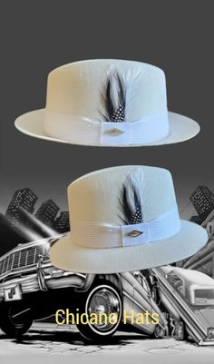 "Frank Garcia traditional  White fine finish  fedora lowrider hat made of 100% woven finest cotton string comes with a white band. Also comes with a silk inside liner, real rooster feather, pearl pin and hat pendant. 2\" brim." White Fedora Panama Hat For Kentucky Derby, White Brimmed Fedora For Kentucky Derby, White Fedora For Kentucky Derby, White Flat Brim Panama Hat For Kentucky Derby, White Western Panama Hat With Short Brim, White Western Fedora Panama Hat, Classic White Fedora Sun Hat, Western White Panama Hat For Kentucky Derby, White Fitted Panama Hat With Curved Brim