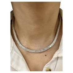 This stunning diamond necklace has 120 emerald cut diamonds weighing 40.66 ct. The diamonds boast a color E/F and are VS1 in color. This magnificent piece is sure to turn heads. Diamond Tennis Necklace, Cartier Panthere, Bracelet Love, Colombian Emeralds, Tennis Necklace, Modern Necklaces, Emerald Cut Diamonds, Stunning Necklace, Emerald Diamond