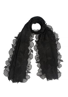 Wrap yourself in the ethereal beauty of this stunning black scarf featuring an eye-turning hibiscus floral embroidery border handcrafted in a tonal black color. Woven from the finest cashmere, this versatile and captivating scarf offers unparalleled style and oomph whilst keeping you comfortably warm. Embrace the opulence of cashmere and express your unique fashion sense by adorning this statement piece. Black is black but this piece is so much more. Floral Embroidery Border, Black Cashmere Scarf, Black Hibiscus, Black Is Black, Embroidery Scarf, Embroidery Border, Black Scarf, Ethereal Beauty, Cashmere Scarf