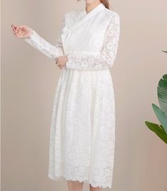 This is a Korean Modern Hanbok Dress for Women.It is wrap style lace long dress in white color.This hanbok is modernly designed so you can wear it comfortably and beautifully.This modern hanbok is perfect dress for special celebrations such as wedding, engagement parties or various events. If you choose a Dress and Chiffon Skirt together, the skirt worn by the model in the photo will be delivered.⭐You can create a variety of styles by layering skirts of different colors on this dress. Go look Mo Layering Skirts, Hanbok Women, Modern Hanbok Dress, Long Dress Wedding, Style Long Dress, Hanbok Dress, Dress Korea, Lehenga Red, Modern Hanbok