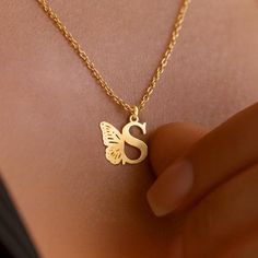 Personalize Your Style with Our Butterfly Initial Necklace. Crafted with precision and attention to detail, this necklace is the perfect way to showcase your personal style. Metal: Stainless Steel Available in a variety of finishes: 🌹 Rose Gold 🟡 18k Gold 🥈 Silver The chain length options include: - 16" - 18" - 20" - 22" Each necklace is meticulously: ✨ Designed ✨ Polished ✨ Assembled Please note: All our items come with a 5 cm/2" extension chain. so don't hesitate about the size!! * 14" NECK Gold Initial Necklace With Name, Personalized Gold Plated Initial Necklace, Silver Gold Plated Initial Necklace, Silver Gold-plated Initial Necklace, Gold Letter Initial Necklace As Personalized Gift, Gold Letter Jewelry With Initials, Personalized Gold Initial Necklace In Metal, Elegant Metal Necklaces With Initials, Elegant Metal Initials Necklace