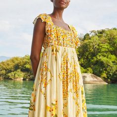 This Dress Features An Easy Fit, Flowy Skirt And Pendants At Bodice For That Unique Touch You Love. Pairs Well With Fresh Sandals, Necklaces, And With The Breeze! New - Never Worn Ships Immediately After Purchase Yellow Ruffled Maxi Sundress, Yellow Maxi Sundress With Ruffles, Yellow Square Neck Dress For Vacation, Yellow Square Neck Summer Midi Dress, Yellow Square Neck Sundress For Spring, Yellow Sundress With Square Neck For Spring, Yellow Midi Sundress For Garden Party, Yellow Square Neck Beach Dress, Yellow Square Neck Summer Sundress