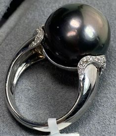 GIANT 18K White Gold Tahitian Black Pearl Diamond Vintage Cocktail Ring Size 6 | eBay Luxury Tahitian Pearl Jewelry, Luxury Tahitian Pearl Jewelry With Diamond Accents, Formal Black Tahitian Pearl Jewelry, Classic White Gold Tahitian Pearl Rings, Luxury Silver Tahitian Pearl Ring, Luxury Tahitian Pearl Ring For Formal Occasions, Black Tahitian Pearl Fine Jewelry, Classic Black Pearl Ring, White Gold Tahitian Pearl Rings For Formal Occasions