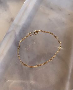 "* 14k gold filled delicate twist chain bracelet * Customizable length from 6.5\" - 7.5\" * Handmade in SB, California * Expected shipping 4-7 business days" Delicate Rose Gold 14k Gold Filled Bracelet, Dainty 14k Gold Bracelet With Gold Chain, Delicate Rose Gold 14k Gold-filled Bracelet, Delicate Gold Jewelry With Curb Chain, Dainty Gold Curb Chain Bracelet, Dainty Yellow Gold Curb Chain Bracelet, Dainty Yellow Gold Chain Bracelet With Curb Chain, Delicate Rose Gold Bracelet In 14k Gold Filled, Delicate 14k Gold-filled Chain Bracelet