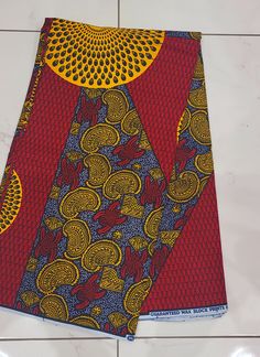 African Print Fabric by the Yard, African Print Fabric/ Ankara, Red and Khaki - Etsy Colorful Patterned Red Ankara Fabric, Red Traditional Block Print Fabric, Red Fabric With Unique Traditional Pattern, Traditional Red Ankara Fabric, Traditional Red Block Print Fabric, Red Batik Print Cotton Fabric, Red Cotton Fabric With Batik Print, Red Ankara Fabric With Traditional Patterns, Red Cotton Fabric With Colorful Pattern