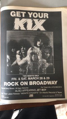 an advertisement for the rock on broadway show is held up in front of a person's hand