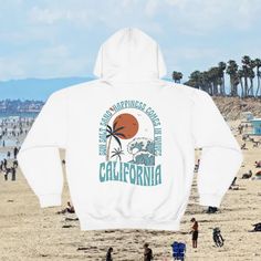 California Beach Hoodie, California Hoodie Sweatshirt CA Surf Hoodie, California Trendy Hoodie Coconut Hoodie: This unisex heavy blend hooded sweatshirt is relaxation itself. Made with a thick blend of cotton and polyester, it feels plush, soft and warm, a perfect choice for any cold day. In the front, the spacious kangaroo pocket adds daily practicality while the hood's drawstring is the same color as the base sweater for extra style points. .: 50% cotton, 50% polyester (fiber content may vary for different colors) .: Medium-heavy fabric (8.0 oz/yd² (271 g/m .: Classic fit .: Tear-away label .: Runs true to size Casual Hoodie For Outdoor Activities, Casual Double-lined Hooded Sweatshirt For Outdoors, Casual Hooded Hoodie For Outdoor Activities, Outdoor Hoodie With Kangaroo Pocket, Hoodie With Kangaroo Pocket For Outdoor Activities, Casual Hoodie With Double-lined Hood For Outdoor Activities, White Long Sleeve Hoodie For Outdoor Activities, Urban Hoodie With Letter Print For Outdoor Activities, Outdoor Hoodie With Adjustable Hood