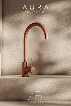 a faucet with the name aura collection on it