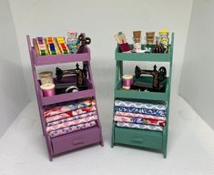 two shelves with sewing supplies on them