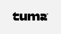 the word tuma written in black and white with an arrow pointing up to it