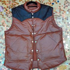 Choco 100% Lamb Leather Silk Lining Classic Brown Outdoor Vest, Classic Brown Vest For Outdoor, Fitted Leather Winter Vest, Fitted Brown Outerwear With Snap Buttons, Brown Fitted Outerwear With Snap Buttons, Fitted Leather Vest For Winter, Classic Outdoor Vest For Fall, Fitted Winter Vest With Snap Buttons, Fitted Brown Outerwear With Padded Collar