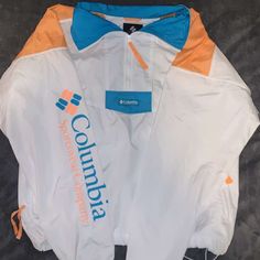 Columbia Windbreaker In Almost Brand New Condition. White Sports Windbreaker With Pockets, Sports White Windbreaker With Pockets, White Windbreaker With Pockets For Outdoor, White Sports Outerwear With Pockets, White Long Sleeve Windbreaker For Outdoor Activities, White Sporty Windbreaker With Pockets, White Hooded Tops For Outdoor Activities, Sporty White Windbreaker With Pockets, Casual White Long Sleeve Windbreaker