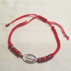 Handmade. Silver Tone. Adjustable. Adjustable Red Bracelet With Rhinestones, Nickel-free Red Beaded Bracelet As Gift, Adjustable Red Jewelry With Silver Beads, Red Bracelets With Silver Beads For Jewelry Making, Red Adjustable Nickel-free Bracelet, Adjustable Red Nickel-free Bracelets, Adjustable Nickel-free Red Bracelet, Adjustable Red Nickel-free Bracelet, Red Bracelets With Silver Beads For Gift