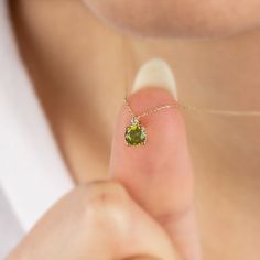 "Our single diamond tiny round peridot necklace is an elegant jewel to wear whenever you want. A meaningful gift that can be given as a birthday gift to those born in August 🤍🤍 Special gifts for your special moments. We produce our jewelery for you in the most perfect way. 🤍🤍 All of our products are carefully crafted from 14K Solid Gold and Real Diamonds. FEATURES * Made to order. * Gold Color Selection: Yellow Gold, Rose Gold, White Gold * Gold KT: 14K * Length: 14\", 16\", 18\", 20\", 22\" Dainty Green Diamond Necklaces, Delicate Green Birthstone Necklace, Green Diamond Necklace Gift, Green Round Diamond Necklace Gift, Green Diamond Necklace For Gift, Delicate Round May Birthstone Necklace, May Birthstone Diamond Necklace Gift, Dainty Green Round Birthstone Necklace, Fine Jewelry Solitaire Necklace For May Birthstone Gift