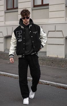 Varsity Jackets For Men Outfits, How To Style Black Varsity Jacket, Outfit Inspo Varsity Jacket, Boys Jackets Fashion Outfit, Styling Varsity Jacket Man, Outfit Ideas With Varsity Jackets, Mens Outfit Ideas Street Style Fashion, Lettermen Jacket Outfit Men, Varsity Jacket For Men