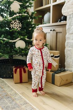 Embrace the magic of the holiday season with our Red Nutcracker Bamboo Cozy Set, perfect for making cherished memories with the whole family. Crafted from ultra-soft and breathable bamboo fabric, this festive set ensures a cozy and comfortable night's sleep. Available in sizes from 0-3 months to 11/12 years, it's perfect for your little ones, while matching adult pajamas let everyone join in on the fun. Ideal for Christmas morning photos, holiday movie nights, or simply enjoying the winter seaso Red Nutcracker, Holiday Movie Night, Graphic Onesies, French Baby, Diaper Bag Accessories, Nursing Accessories, Adult Pajamas, Toddler Fall, Swaddle Sets