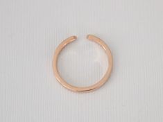 14K rose gold slightly tapered half eternity cuff ring set with round brilliant cut diamonds weighing 0.12 ct (G/VS2,SI1). 2.1 mm band, available in all sizes. Also available in 14K white or yellow gold, 18K (any color), platinum and palladium. Please send us an email for these options. *Made to order *SKU 16-101473 Rose Gold Stackable Open Band Rings, Rose Gold Open Band Diamond Ring, Modern Rose Gold Midi Ring With Open Band, Diamond Cuff Ring, Cuff Ring, Full Eternity Ring, Three Rings, Cuff Rings, Round Brilliant Cut Diamond