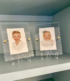 two pictures are placed on top of each other in a glass case with scalloped edges