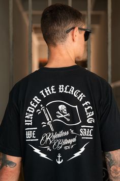 In a pirate’s life, If you’re sailing under the black flag then you know quarter was given for your life after the rummage. It’s means for a pirate to move forward and know there is more sea to sail, more freedom to be sought. UNDER THE BLACK FLAG WE SAIL! • UNISEX item • 100% fine jersey cotton Model is 6'1 wearing a size L Relentless Betrayal, Couples Matching Outfits Swag, Sink Or Swim, White Crop Tank, Pirate Flag, Nautical Design, Matching Couple Outfits, Black Flag, Flag Tshirt