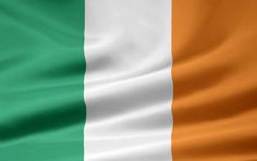 the irish and irish flag is shown in this close up photo, with silky folds