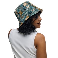 Inspired by the traditional barkcloth designs of the Pacific Islands, our Tapa Cloth print reversible bucket hat features bold tribal patterns on one side and a plain color on the other. This versatile and stylish hat gives you two unique looks in one, adding a touch of island charm to any outfit. Stay cool and stylish wherever you go!This reversible bucket hat can be worn on both sides, making it easy to match with different outfits. Made of breathable premium fabric, this hat will become your Tapa Cloth, Country Wall Clock, Reversible Bucket Hat, Pacific Islands, Streetwear Accessories, Stylish Hats, Plain Color, Different Outfits, Sweatshirt Shirt