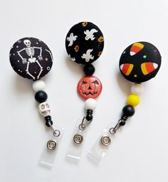 "Nurse Badge Reel, Fall Badge Reel, Retractable Badge, Halloween Badge Reel, ID Badge Holder, ID Badge Reel, Beaded Badge Reel, Badge Holder This halloween beaded badge reels are the perfect way to add some flair to your ID badge. These design are perfect for hospital staff, including nurses, doctors, pharmacists, and even nursing and medical students. Or anyone who wears a badge. These badges are now interchangeable. They are backed with heavy duty Velcro, allowing you to easily remove and chan Black Retractable Badge Holders As Gift, Adjustable Black Retractable Badge Holder, Black Adjustable Retractable Badge Holders, Novelty Black Badge Reel Customizable, Customizable Black Novelty Badge Reel, Customizable Novelty Black Badge Reel, Black Retractable Badge Reel For Gift, Customizable Black Badge Reel, Black Badge Reel With Swivel Clip As A Gift