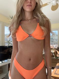 Orange Floral Reversible Cheeky Bikini Set Stretch Triangle Top Swimwear In Orange, Trendy Orange Swimwear For Pool, Orange Triangle Top Swimwear, Bra Friendly, Orange Triangle Top Swimwear Bra-friendly, Orange Bra-friendly Triangle Top Swimwear, Trendy Orange Swimwear For Sunbathing, Trendy Orange Beach Party Swimwear, Trendy Orange Swimwear For Swimming, Orange Bra Friendly Swimwear