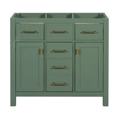 a green cabinet with gold handles and drawers