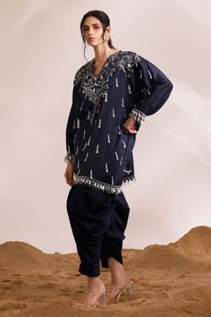 Navy short boxy kaftan with phoenix-inspired motifs, pearl-infused tassel embellishments. Comes with solid dhoti pant. - Aza Fashions Hand Embellished Straight Kurta For Festivals, Traditional Hand Embellished Straight Kurta Salwar Kameez, Traditional Kaftan With Tassels, Traditional Hand Embellished Sets For Navratri, Traditional Hand Embellished Sets For Eid, Hand Embellished Traditional Sets For Navratri, Traditional Hand Embellished Palazzo Set For Eid, Traditional Tassel Kaftan With Drape, Festive Traditional Kaftan With Tassels