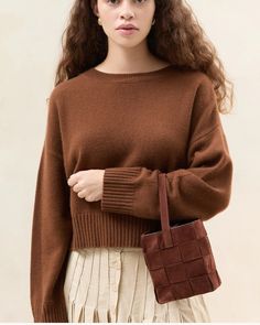 Introducing the Loeffler Randall Laith Wide Woven Top Handle Bag, a small but luxurious accessory. Made from espresso brown wide woven suede and featuring a vachetta leather strap, drawstring closure, and full lining, this bag exudes elegance and sophistication. Elevate any outfit with this exclusive piece. AS WE PREPARE TO CLOSE OUR DOORS AT THE END OF THE YEAR, PLEASE NOTE THAT ALL SALES ARE FINAL AND NOT ELIGIBLE FOR PRICE ADJUSTMENTS AT A LATER DATE. Brown Bags With Braided Handles For Fall, Brown Shoulder Bag With Braided Handles For Fall, Brown Leather Bags For Winter, Chic Brown Shoulder Bag For Fall, Leather Shoulder Bag With Braided Handles For Fall, Elegant Brown Bag For Winter, Elegant Brown Winter Bags, Fall Bags With Leather Trim, Modern Brown Shoulder Bag For Fall