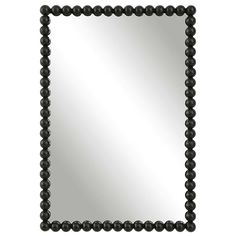 a black beaded mirror on a white background