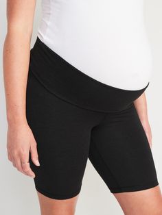 Elasticized rollover waistband, with light-reflecting Old Navy Active logo at center back.  Soft, breathable low compression jersey holds you in while letting you vent.  Go-Dry moisture-wicking technology keeps you dry & comfortable.  Four-way super stretch for ultimate movement.  Flat-lock seams prevent chafing.  Versatile panel rolls up or down for added support.  Fitted through hip and thigh.  Maternity biker shorts hit mid-thigh.  8" inseam (sizes XXS-M), 8 1/4" inseam (size L), 8 1/2" insea Yoga Activewear Shorts With Waistband, Compression Activewear With Waistband For Workout, Yoga Activewear With Waistband In Short Length, Fitted Sporty Activewear With Waistband, Sports Activewear With Waistband Shorts, Sporty Fitted Activewear With Waistband, Black Activewear With 5-inch Inseam And Comfort Stretch, Functional Black Shorts With Contoured Waistband, Black Functional Shorts With Contoured Waistband