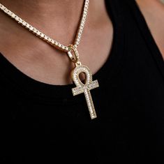 Introducing the Diamond Baguette Ankh Cross Pendant in 18k Yellow Gold. This ancient Egyptian cross symbolizes life, featuring a teardrop shaped hoop with a connected cross directly below it to represent the sun making its way over the horizon. Fully iced out in hand-set baguette stones, this piece will instantly draw attention and shine from every angle. This product is guaranteed for life - GLD will repair the item should you experience any defects in craftsmanship or breakage. Specifications Luxury Gold Ankh Jewelry, Egyptian Cross, Ankh Cross, Diamond Baguette, Vermeil Jewelry, Custom Earrings, Baguette Diamond, The Horizon, Pendant Bracelet