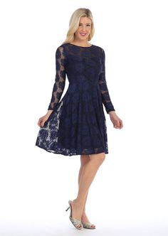 Turn heads in this floral lace cocktail dress with sheer long sleeves by Celavie 6327. This beautiful knee length dress features a scoop neck bodice embroidered with rose floral appliques, sheer lace sleeves, short A-line skirt that falls at the knees, and a zipper closure. Affordably priced at $99, this short party dress is perfect for any formal event and will keep you on budget! Designer: Celavie Style Number: 6327 Material: Lace, 100% Polyester Details: Bra Cup, Fully Lined Fit: The model is Short Dress With Long Sleeves, Lace Short Dress, Strapless Lace Wedding Dress, Wedding Guest Dresses Long, Elegant Wedding Guest Dress, Floral Lace Shorts, Cape Wedding Dress, Military Ball Dresses, Cocktail Formal