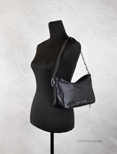 Style: Marc Jacobs Tempo Small Black Hobo Convertible Shoulder Handbag Material: Smooth Leather Features: Shoulder Strap, Zip Closure, Inner Zip Pocket, Fabric Lined Measures: 11“ L x 5.5“ H x 3.5“ D Black Satchel Bag With Branded Hardware, Black Baguette Bag Satchel With Silver-tone Hardware, Black Leather Baguette Bag With Branded Hardware, Black Baguette Bag With Branded Hardware For Travel, Black Baguette Bag With Branded Hardware For Daily Use, Black Baguette Shoulder Bag With Branded Hardware, Black Baguette Bag With Silver-tone Hardware For Travel, Black Top Handle Baguette Bag With Silver-tone Hardware, Black Baguette Crossbody Bag With Silver-tone Hardware