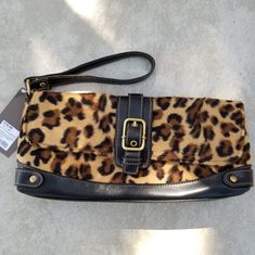 Merona Leopard Print Clutch Wallet Wristlet Brown Clutch With Removable Pouch As Fashion Accessory, Trendy Brown Clutch, Brown Handheld Clutch With Detachable Strap, Brown Handheld Clutch With Adjustable Strap, Trendy Brown Wristlet For Travel, Brown Rectangular Clutch With Fold Over Clasp, Brown Travel Wristlet With Adjustable Strap, Trendy Brown Rectangular Wristlet, Leopard Print Shoulder Bag With Removable Pouch