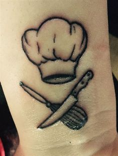 a chef's hat and knife tattoo on the ankle