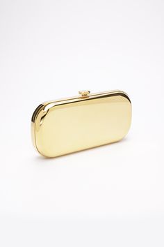 The Golden Bella Clutch is solid brass with a gold finish mirror. The sleek Bella Clutch silhouette offers a soft touch with added modern-day glam. From the red carpet to your wedding white carpet, the reflective Golden Bella Clutch is the perfect handbag with a touch of glam to carry your personal items and smartphone. The Golden Bella Clutch frame is handcrafted and made to order by Italian artisans. The Bella Clutch includes the option to personalize your handbag with a custom engraved sentim Luxury Rectangular Clutch With Gold-tone Hardware, Chic Yellow Gold Rectangular Bag, Luxury Gold Rectangular Case Bag, Elegant Yellow Gold Bags With Gold-tone Hardware, Formal Yellow Gold Bag With Gold-tone Logo Plaque, Modern Evening Bags With Gold-tone Logo, Modern Evening Bags With Gold-tone Logo Plaque, Modern Rectangular Clutch With Gold-tone Hardware, Modern Evening Bag With Gold-tone Logo Plaque