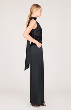 Our signature one shoulder bias cut top with an attached scarf that can be worn loose down the back or wrapped gracefully around the neck. Silk Tie Back Top For Evening, Silk Tie-back Top For Evening, Elegant Cowl Back Top For Evening, Elegant Multi-way Party Tops, Satin Pajama Pants, Cut Top, Pajama Pant, Satin Pajamas, Silk Crepe