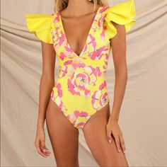 Beautiful Floral Print . One Piece Swimsuit Designer Swimsuit. Never Worn. Dust Bag Included #Designer #Swimsuit #Onepiece #Aguabendita Swimsuit Onepiece, Designer Swimsuit, Beachy One-piece Swimwear With Tropical Print, Pink Printed One-piece Swimwear, Beachy One-piece Floral Print Swimwear, Coral Tie, Tropical Swimsuits, Pink Floral Print One-piece Beachwear, One-piece Swimwear With Vibrant Print For Beach