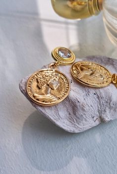 Ladies gold gem set coin charm earrings. 3.5cm in length 18k gold plated post. Matching items available Earrings 3, Charm Earrings, Matching Items, Favorite Things Gift, Wedding Shop, Jewelry Earrings Dangle, Etsy Earrings, Dangle Drop Earrings, 18k Gold