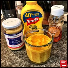 mustard and other condiments on a counter top