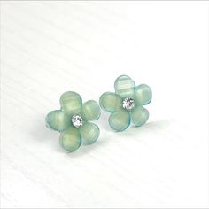 Adorable petite acrylic flowers in shimmering mint green that are embellished with clear crystals in the center. Earrings are mounted on surgical steel posts with ear nuts. Flowers measure just shy of 3/4in (17mm) across. Sage Wedding, Acrylic Flowers, Clear Crystals, Crystal Flower, Greenery Wedding