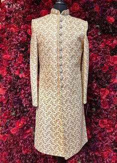 This Arjun Sherwani is designed for that special wedding, semi-formal, or formal. After all, it is truly perfection in an elegant almond white color with intricate gold embroidery and embellishments. It's sophisticated, just as the contemporary bridegroom or man of memories, and this traditional sherwani has been made special for every special occasion. Key Details: Size: Ready-to-ship size; can make any other size within 3-6 weeks. Accessories: Dupatta/Shawl, Mojari/Shoes, Safa/Pagri, and ornam Cream Sherwani, Indian Bridal Couture, Celebrity Closet, Pearl Cream, Gold Embroidery, Sherwani, Key Details, Bridal Couture, Indian Bridal