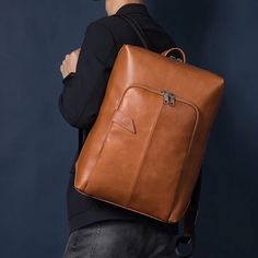 This laptop bag comes with a double-joint shoulder strap ensuring you carry it with ease. It is crafted of genuine leather and has a solid pattern that makes it hard to resist. Showcasing an incredible finish, this laptop bag features a zipper closure to keep your contents safe and is also water-resistant which makes up for a positive point.SpecificationsWith/without interlining: YesWith or without back cotton cushion: YesTexture: CowhideStyle 2: RetroStyle: BusinessSize: LargeShoulder Strap Sty Modern Business Backpack With Leather Backing, Modern Brown Laptop Bag With Large Capacity, Daily Use Laptop Bag Backpack, Business Laptop Bag With Zipper Closure, Rectangular, Rectangular Business Laptop Bag With Zipper Closure, Classic Leather Rectangular Backpack, Luxury Leather Laptop Backpack, Luxury Laptop Backpack With Adjustable Strap, Brown Faux Leather Rectangular Backpack