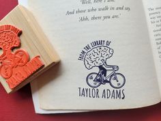 an open book with a rubber stamp on it