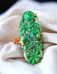 Rare Antique 1920's 18k Yellow Gold Carved Jade Flower Ring Size 5.25 GORGEOUS! Beautiful and extremely well made carved jade ring! * Carvings are of flowers. * Crafted beautifully in solid 18k yellow gold, with a large oval, approximately 18mm x 11mm carved multi-toned green jade oval stone center! * Size 5.25 * Fully Hallmarked and tested 18k yellow gold * Weight: 5.4 grams. * Comes in a gift box, perfect for gift giving! Ships FAST AND FREE, fully insured. I guarantee item to be as described Antique Jade Jewelry, Green Wishlist, Jade Flower, Antique Jade, Tibetan Jewelry, Chinese Ancient, Flower Carving, Carved Jade, Bride Jewelry