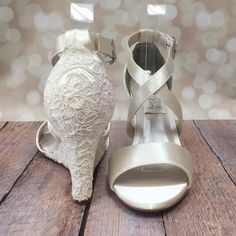 "These ivory wedge wedding shoes, featuring an ivory lace overlay are the perfect accessory for a romantic walk down the aisle. Made-to-order for each bride, these heels measure 3\" (measured as shown here: http://www.customweddingshoe.com/about-ellie-wren/heel-height-measurement/). Color Change: Want this shoe in a different color? We can change the base shoe color for you! To order this shoe in a different color, please send us a CUSTOM REQUEST. To see a complete list of our color options, ple Wedding Shoes Ivory, Dream Wedding Shoes, Romantic Walk, Lace Bridal Shoes, Wedding Wedges, Converse Wedding Shoes, Wedding Shoes Sandals, Custom Wedding Shoes, Wedge Wedding Shoes