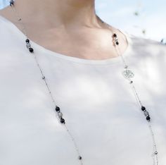 This handmade sterling silver necklace features nine gemstone clusters consisting of grey moonstone, obsidian, and faceted terahertz stone accents, making it the perfect choice for sophisticated, modern women with a heart connected to nature. Moonstone represents the inner goddess and adds a touch of elegance and femininity. The elegant design showcases delicate details that shine brilliantly, making it a versatile and unique addition to any jewelry collection. The Nine collection is a line of Y Terahertz Stone, Connected To Nature, Gray Gemstones, Grey Moonstone, Inner Goddess, Modern Women, Delicate Details, Boutique Jewelry, Handmade Sterling Silver